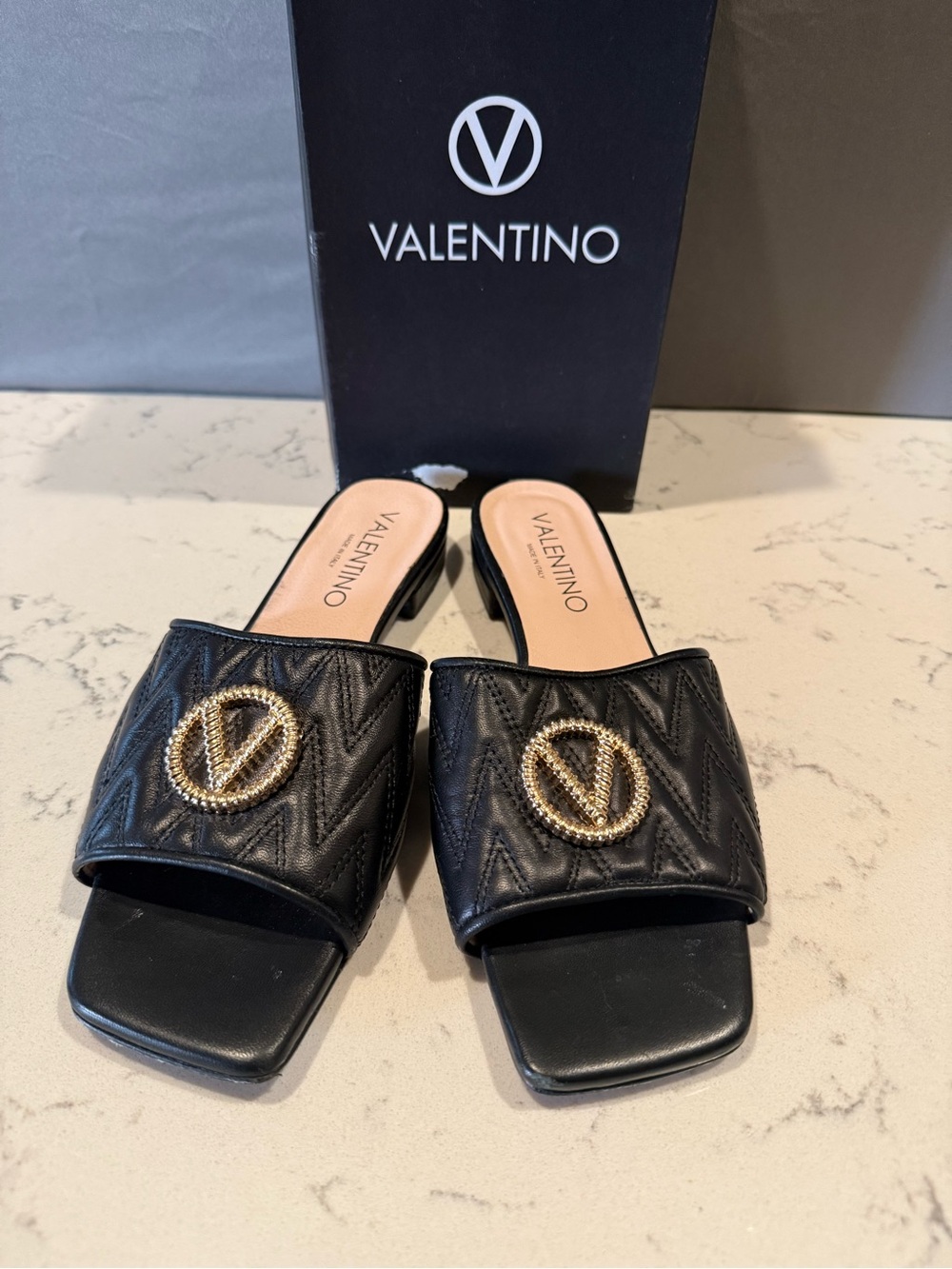 Valentino Black Quilted Leather Slide Mules with Gold Emblem